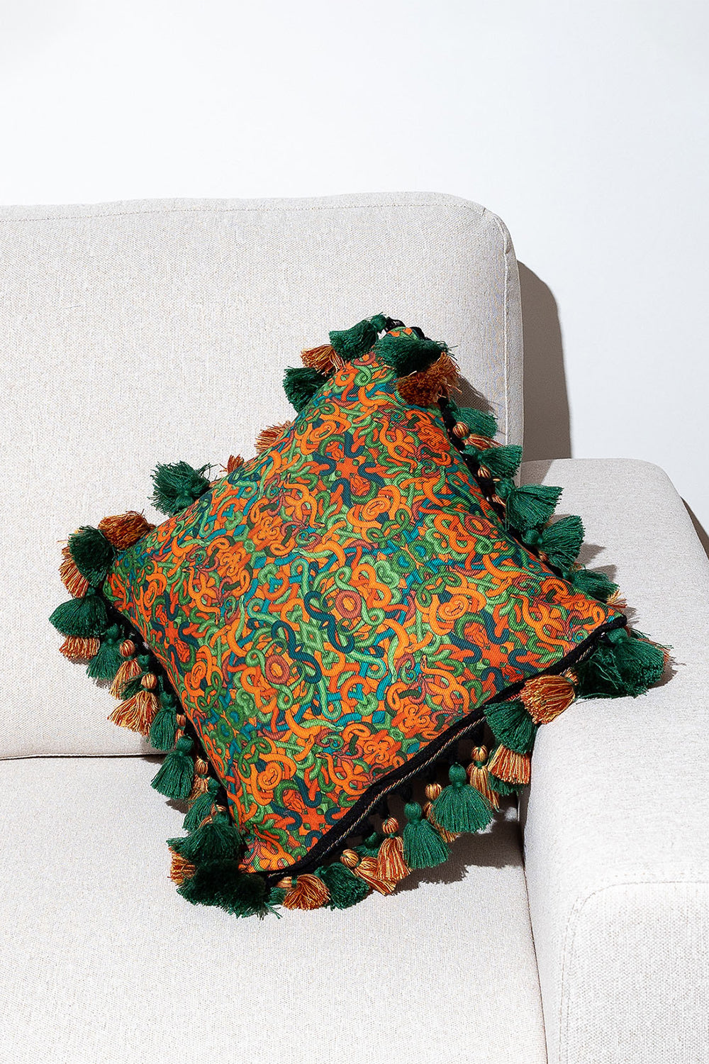 Fringed All Over Snakes And Paisley Print Cushion