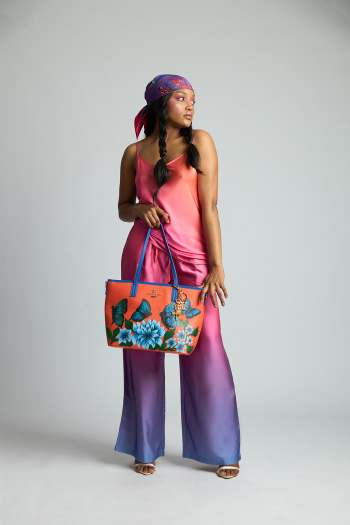 Blue Butterfly Garden Hand Painted Orange Tote Bag