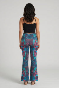 Green and burgundy paisley print mid rise flare trousers with a pull on closure