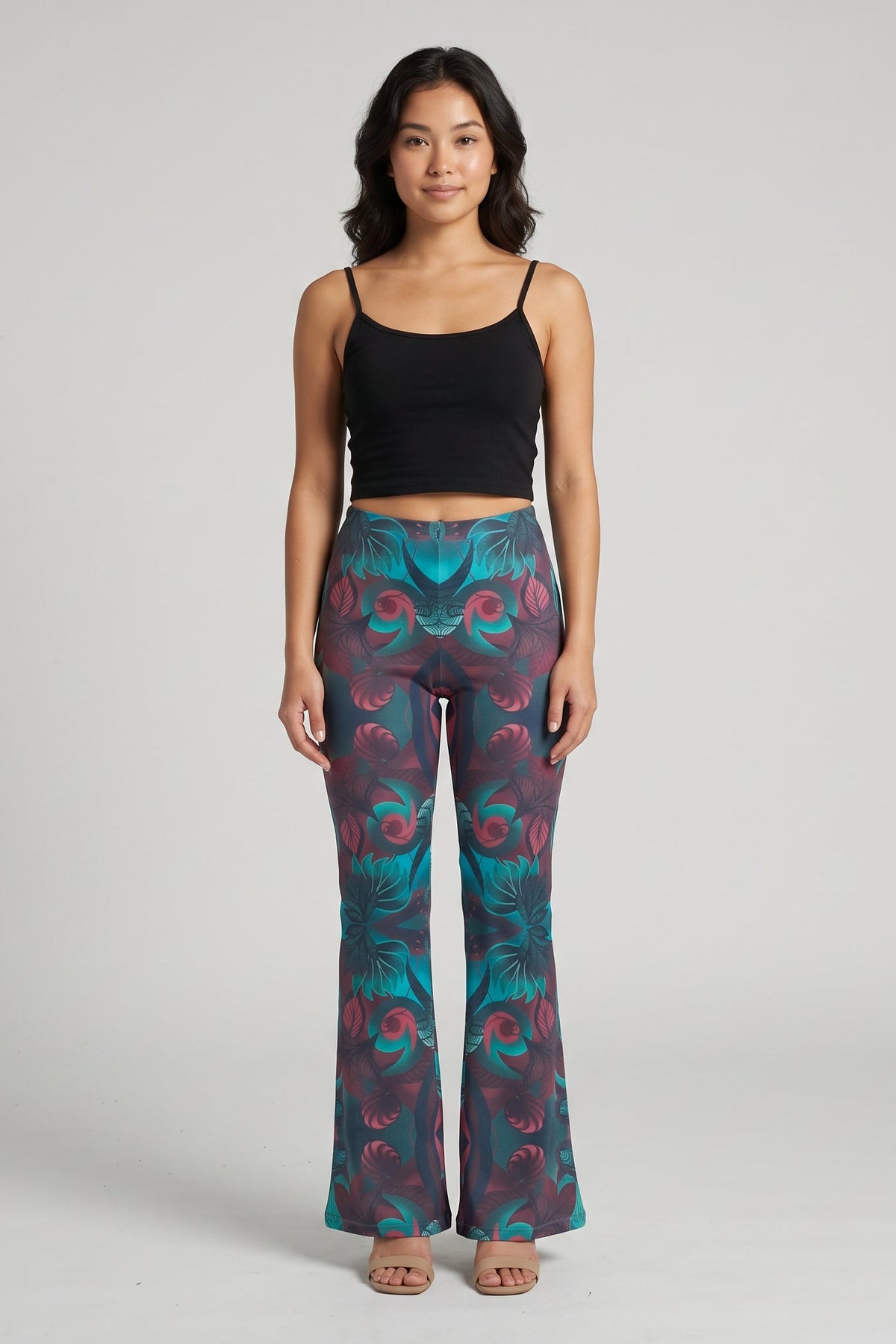 Green and burgundy paisley print mid rise flare trousers with a pull on closure